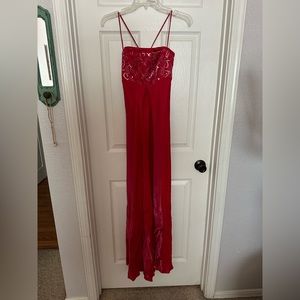 Pinkish red prom dress.